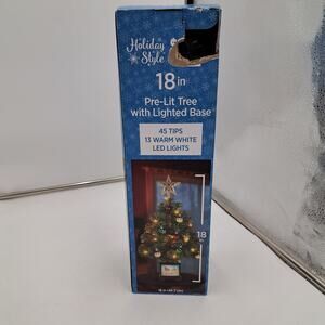 HolidayStyle 18" prelite green tree lighted base 45tips 14warm white LED lights.